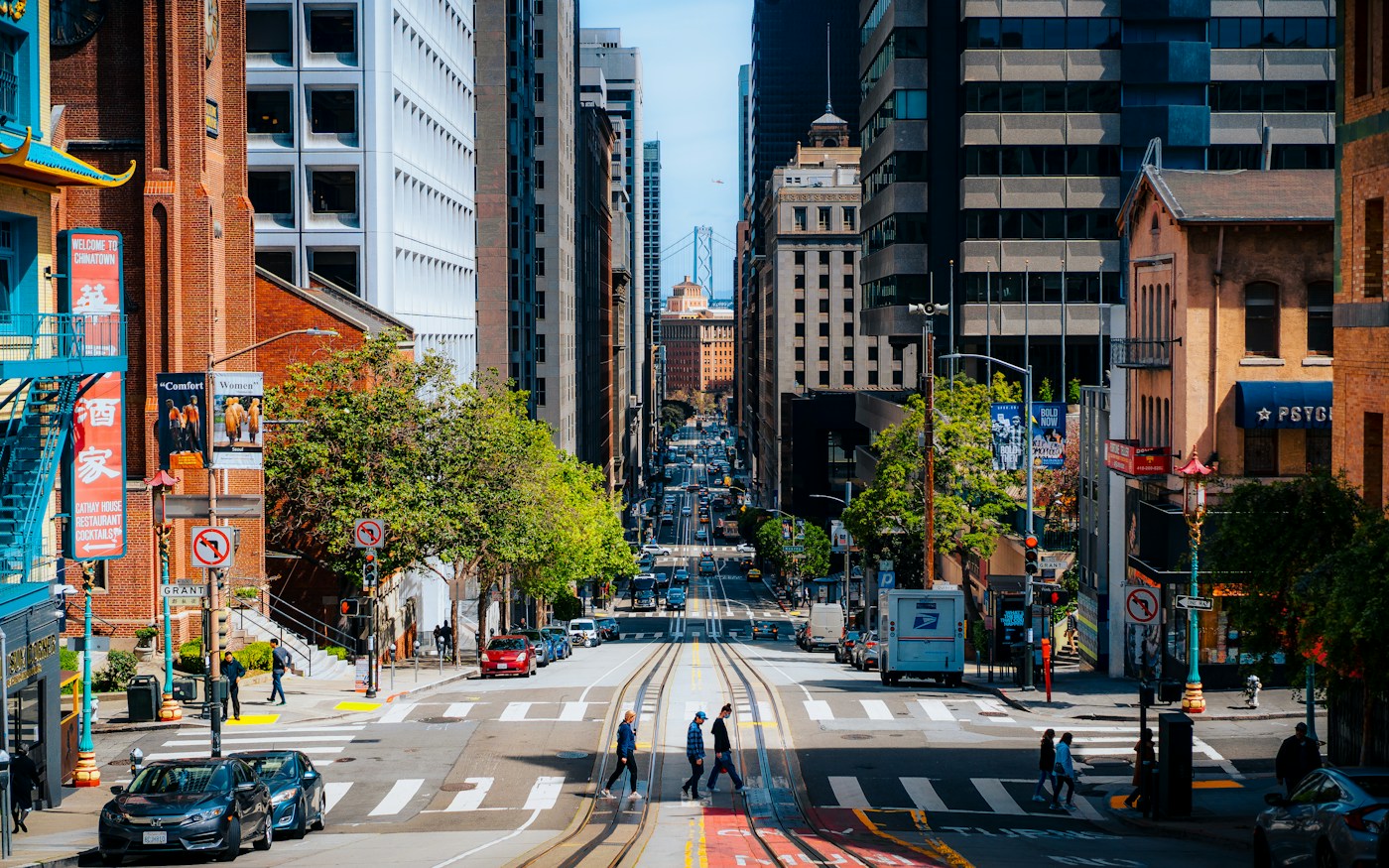 California Street descending through downtown San Francisco toward the Bay Bridge